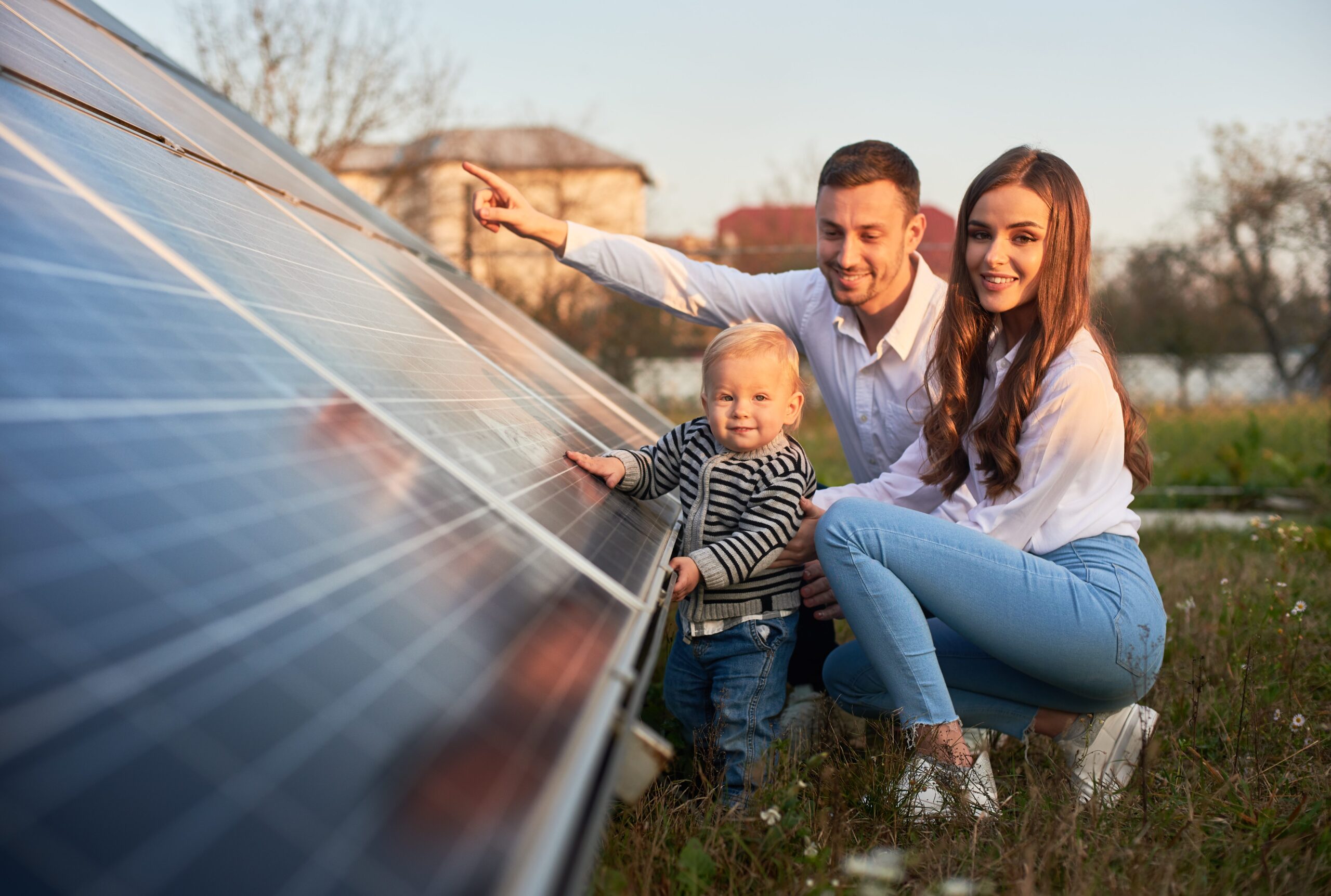 Family reviewing solar panel installation in British Columbia